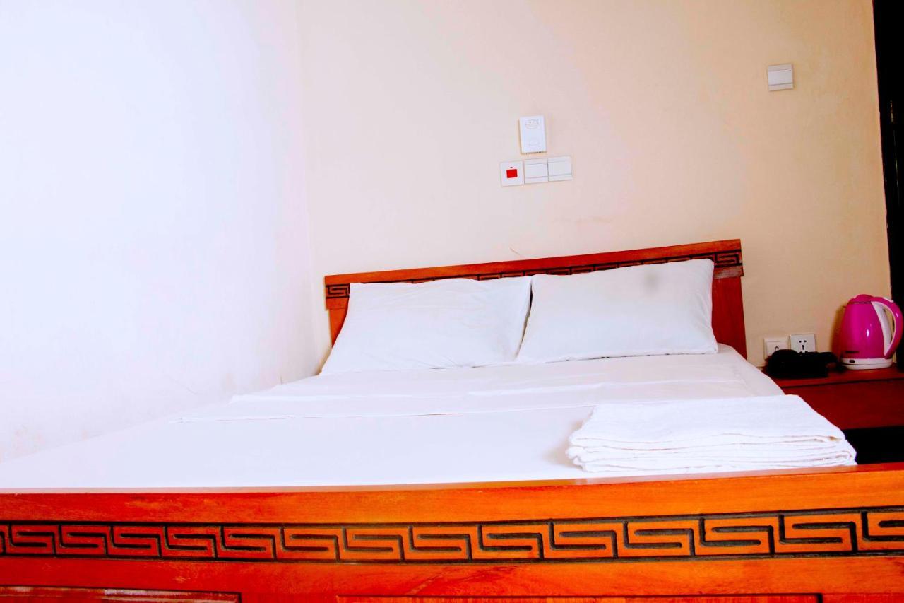 Nora Hotel Cotonou Buitenkant foto