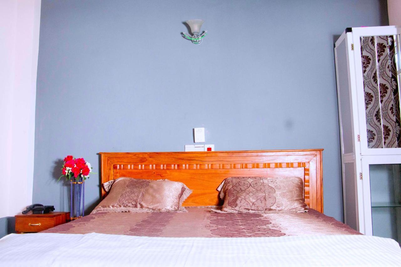 Nora Hotel Cotonou Buitenkant foto
