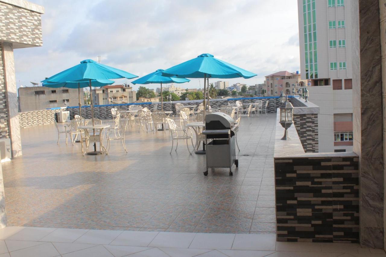 Nora Hotel Cotonou Buitenkant foto